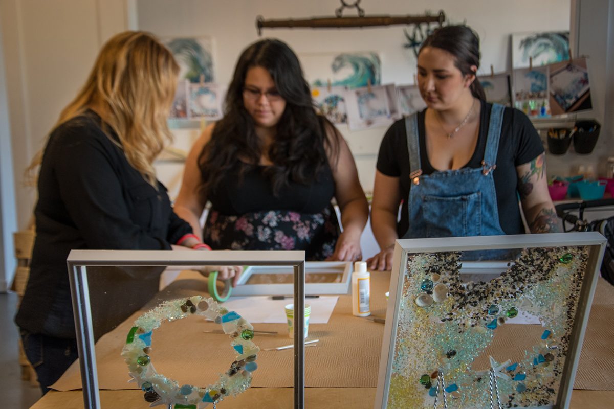 Adults participating in a hands-on art workshop in Port Alberni.