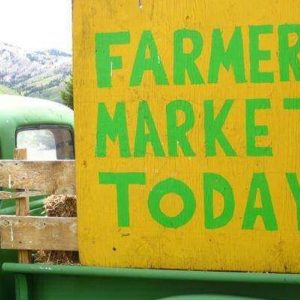 Farmers Market sign on back of truck