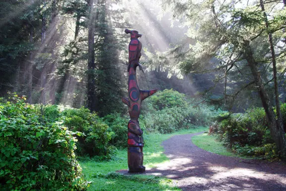 Sun streaming on a Historical Totem Pole in Ucluelet