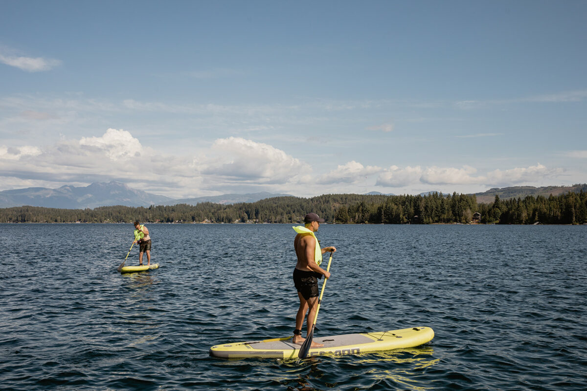 Paddle boarding is a favourite water sports activity on Sproat Lake, Port Alberni, Alberni Valley