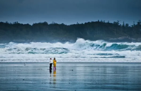 Storm watchers on the beach in Tofino