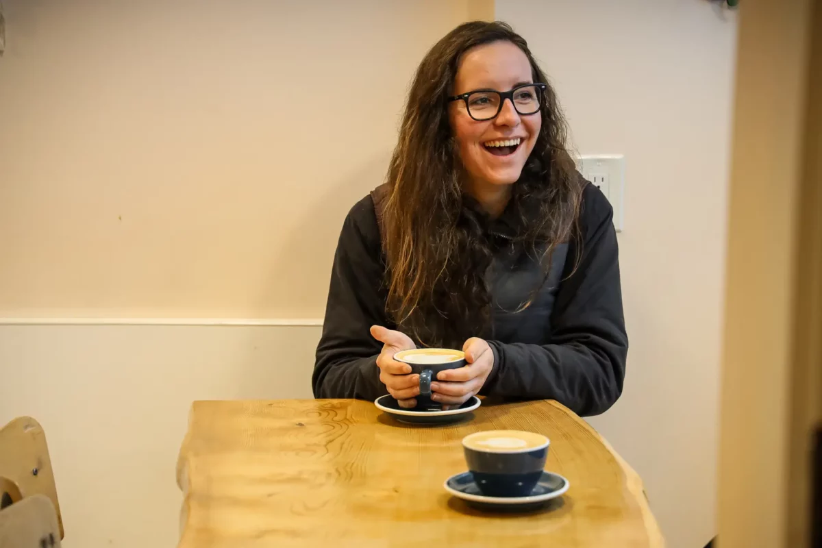 Solo traveller enjoying coffee at Wildflower Bakeshop and Café in Port Alberni