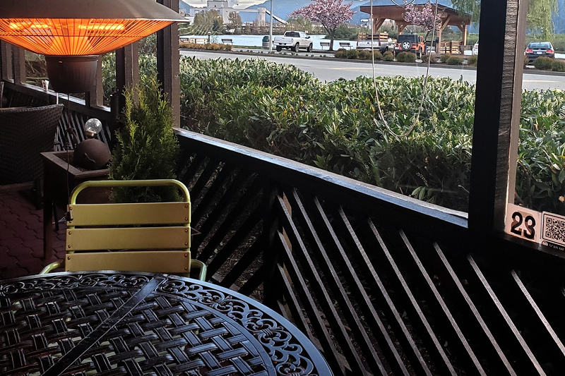 Outdoor patio seating at the Clam Bucket restaurant