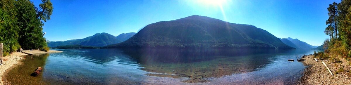 Quiet shoreline at Taylor Arm with clear water and forested surroundings