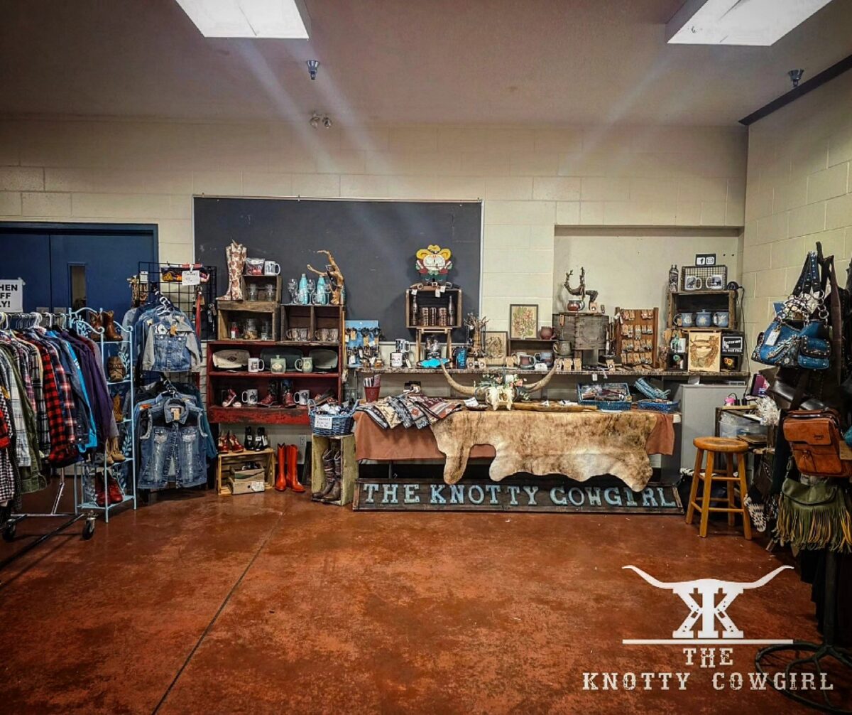 Interior of The Knotty Cowgirl in Port Alberni featuring Western apparel, riding gear, leather handbags, cowboy boots, gifts, and country-themed merchandise displayed throughout the store.
