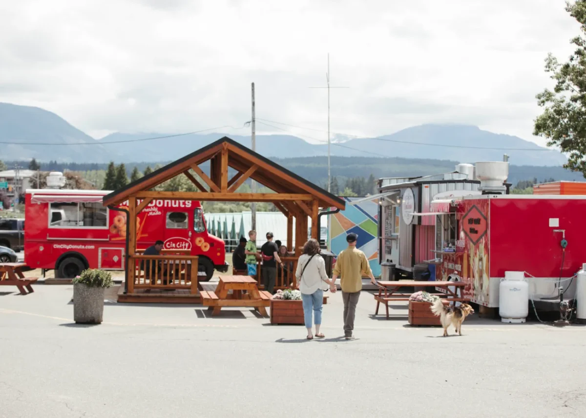 Visitors walking among food vendors at Clutesi Haven Marina in Port Alberni