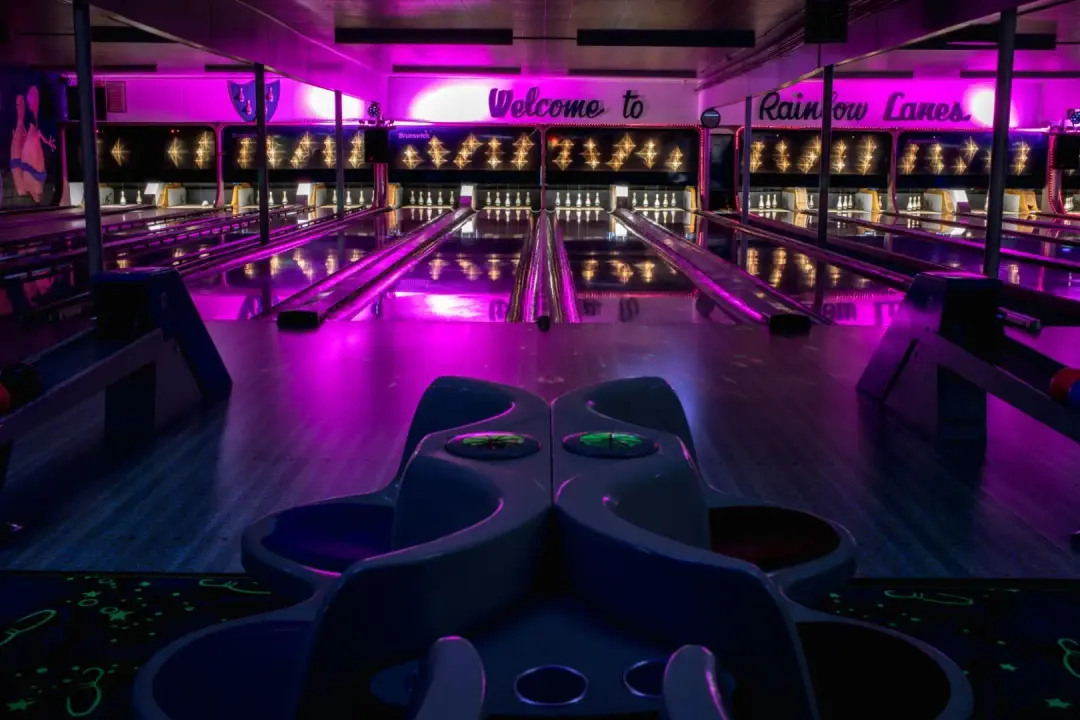  Glow bowling lanes lit with purple lights at Rainbow Lanes in Port Alberni